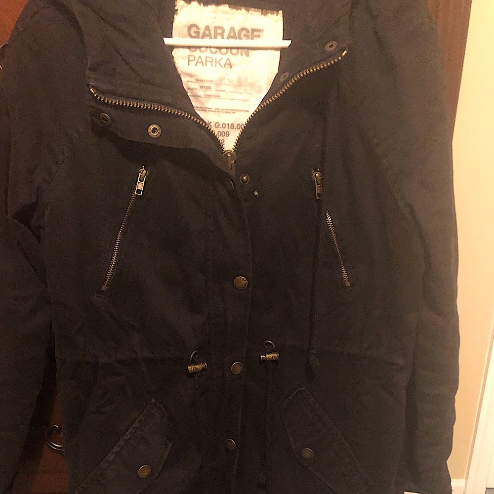 Black parka coat.  Sherpa lined